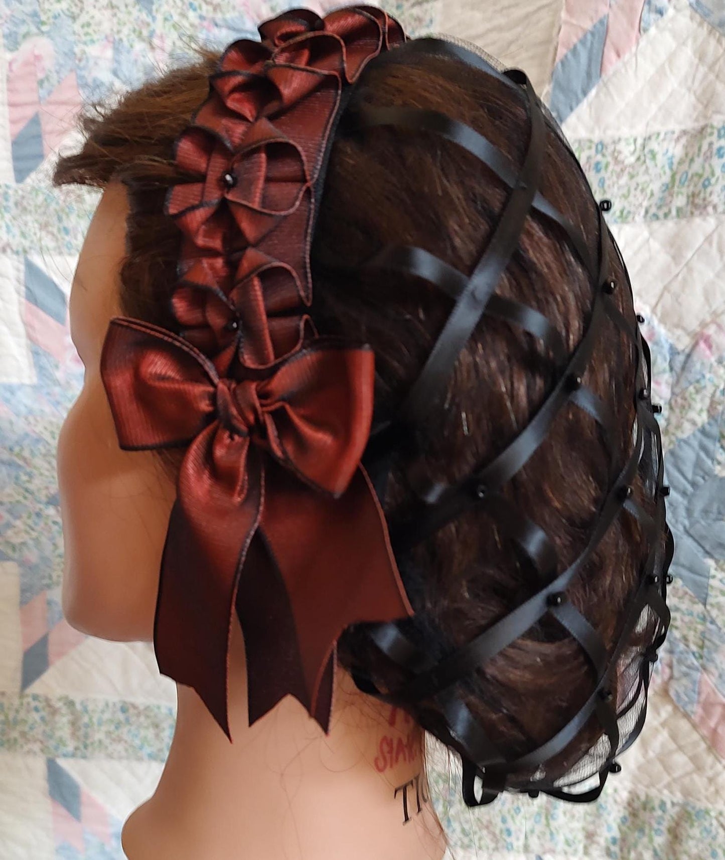 side view of burgandy coronet with beads shows the two tone affect