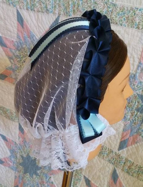 White Lace Fanchon Styled Day Cap with Navy and Baby Blue Ribbon Accents