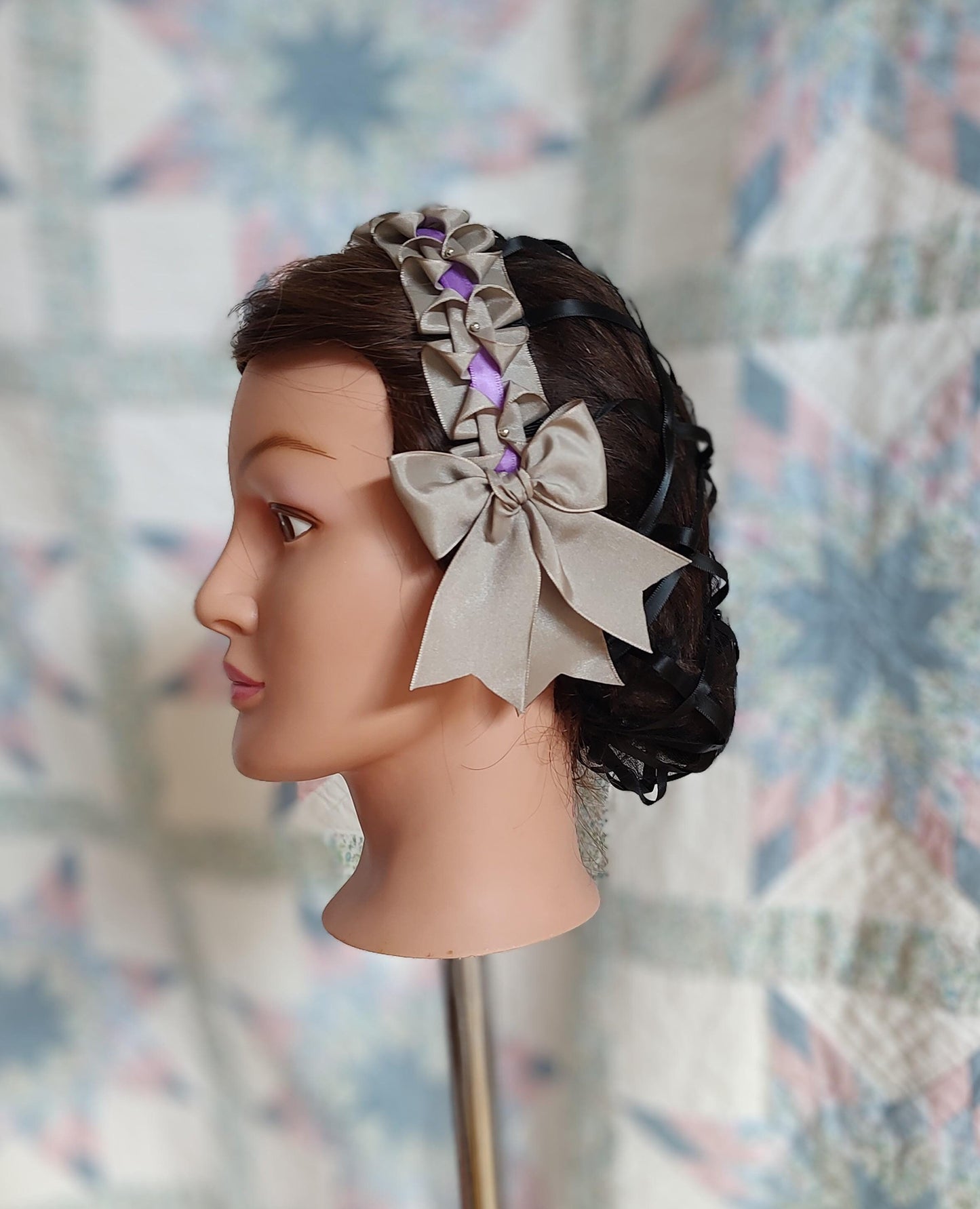 side view of black ribbon hairnet with steel ribbon and purple trim good for second morning