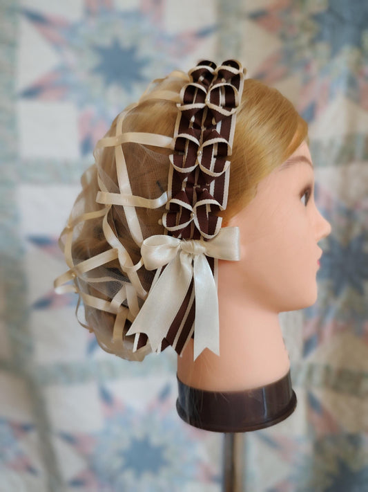 ribbon hairnet from side showing brown stripe with cream bow
