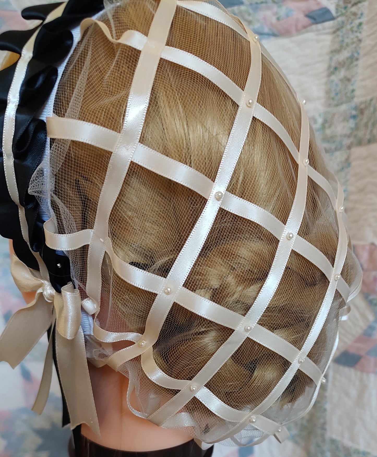 back view of cream ribbon hairnet showing cream tulle